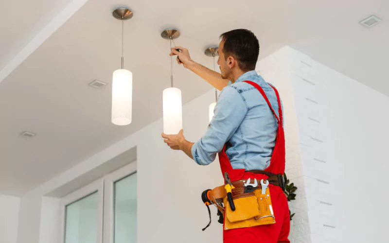 handyman-hanging-light